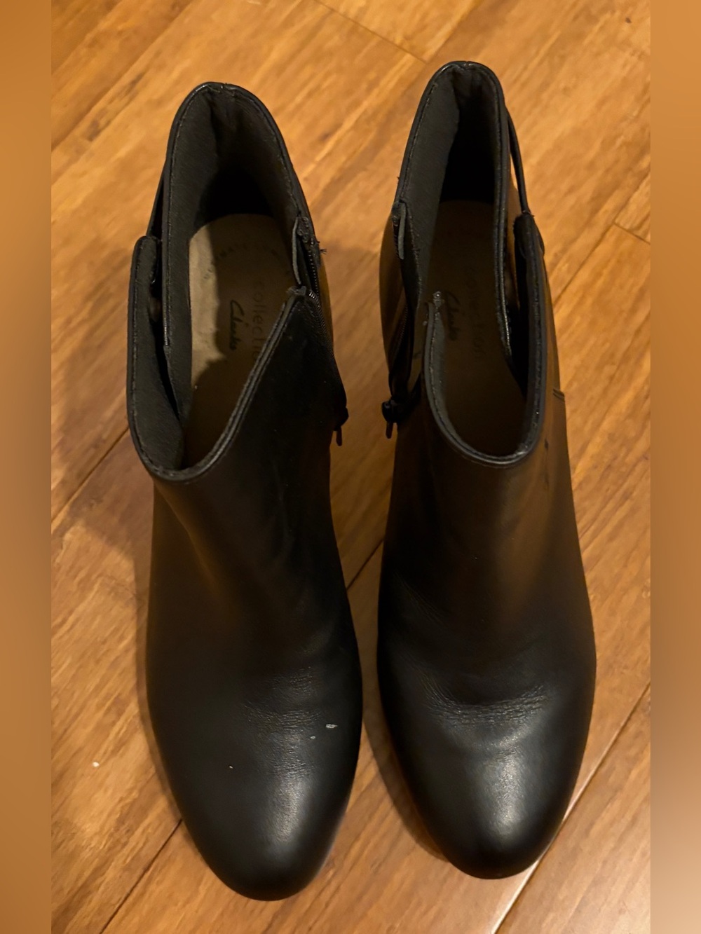 Clarks black ankle booties with strap